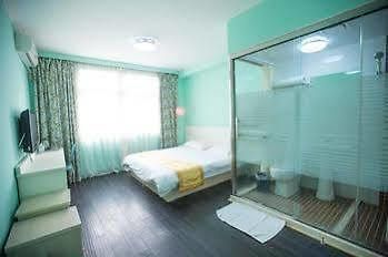 Qingdao Aisen Apartment Hotel Extérieur photo