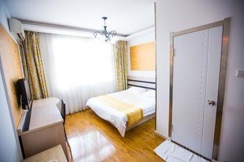 Qingdao Aisen Apartment Hotel Extérieur photo