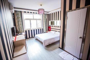 Qingdao Aisen Apartment Hotel Extérieur photo
