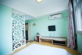 Qingdao Aisen Apartment Hotel Extérieur photo