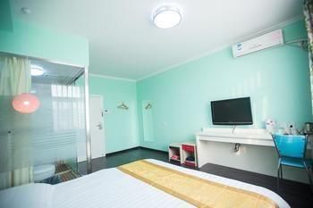 Qingdao Aisen Apartment Hotel Extérieur photo
