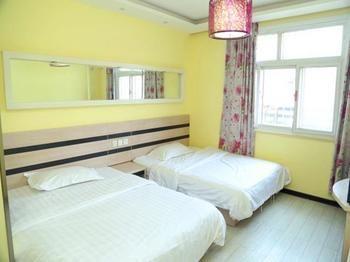 Qingdao Aisen Apartment Hotel Extérieur photo